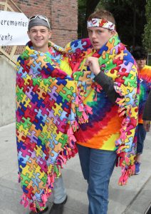 Image of two walkers in a puzzle blanket at the Hero Walk